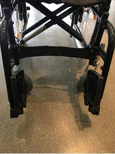 Fold up the footrests.